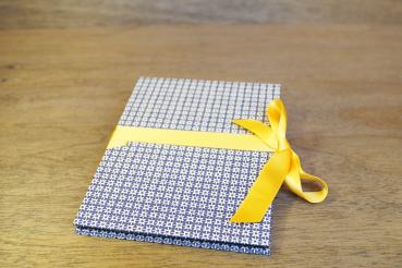 Leporello blue and white checked with yellow bow
